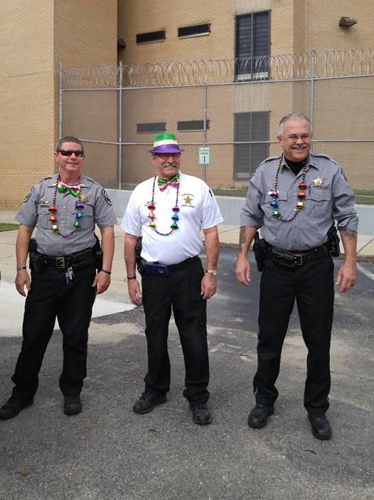 Mardi Gras Parade participants Lt. Adams, Sheriff Joe Sedinger; Sgt. Bert