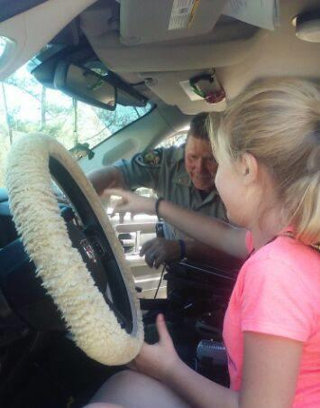 Lt. Adams Explaining Inside of Vehicle