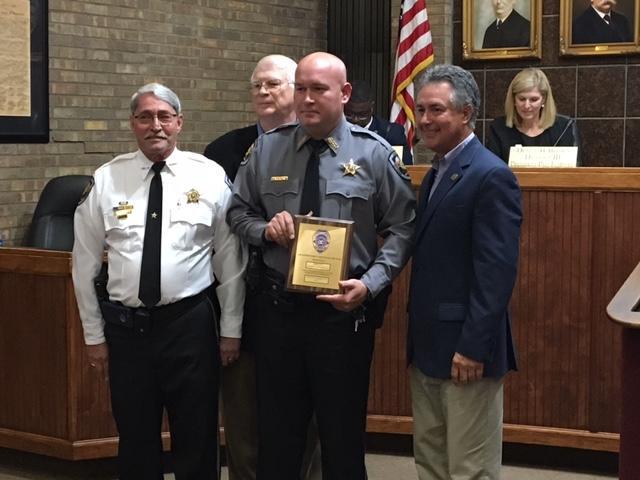 Animal Control/Deputy Josh Averette receiving award during Prattville City Council meeting