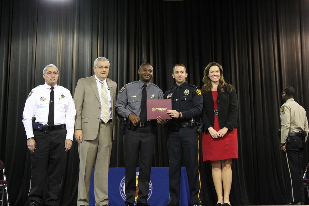 Ryan Holena receiving certificate